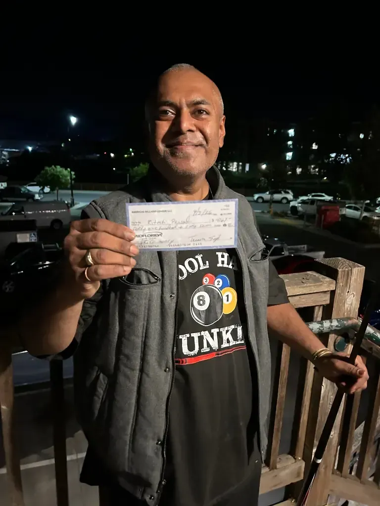 Ritesh with his $4,167 championship winning check